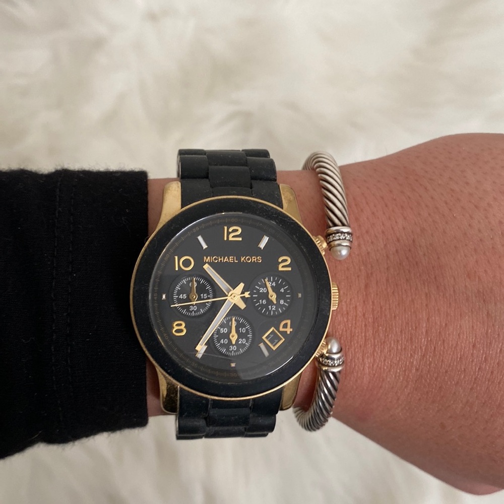 Michael Kors black and gold working watch